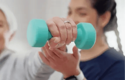 holding a dumbbell to train wrist and arm
